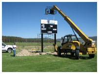 Fraser Valley baseball scoreboard installation by Power to the People